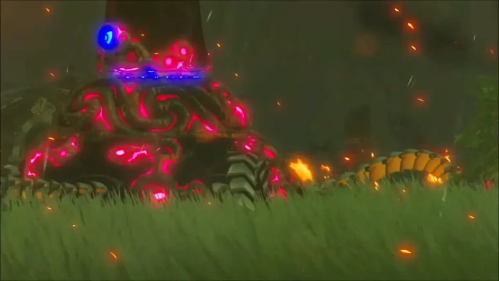 A dormant Guardian glowing red as it lurches to life in the grass A dormant Guardian glowing red as it lurches to life in the grass
