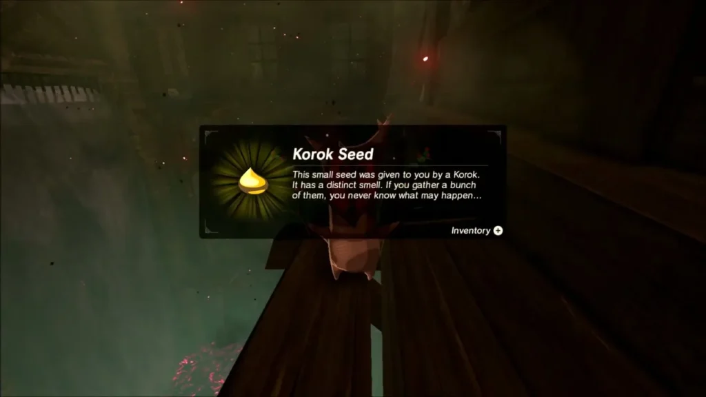 Korok sitting on a wooden beam, with the Korok Seed reward box Korok sitting on a wooden beam, with the Korok Seed reward box