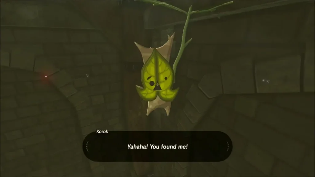 A Korok hanging from a branch saying Yahaha, you found me A Korok hanging from a branch saying Yahaha, you found me