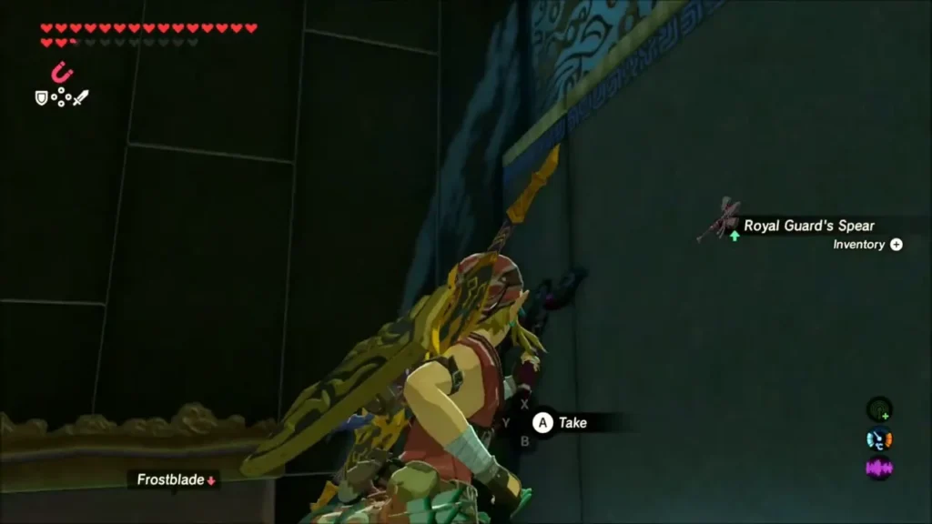 Link picking up a Royal Guard's Spear from a shrine chest Link picking up a Royal Guard's Spear from a shrine chest