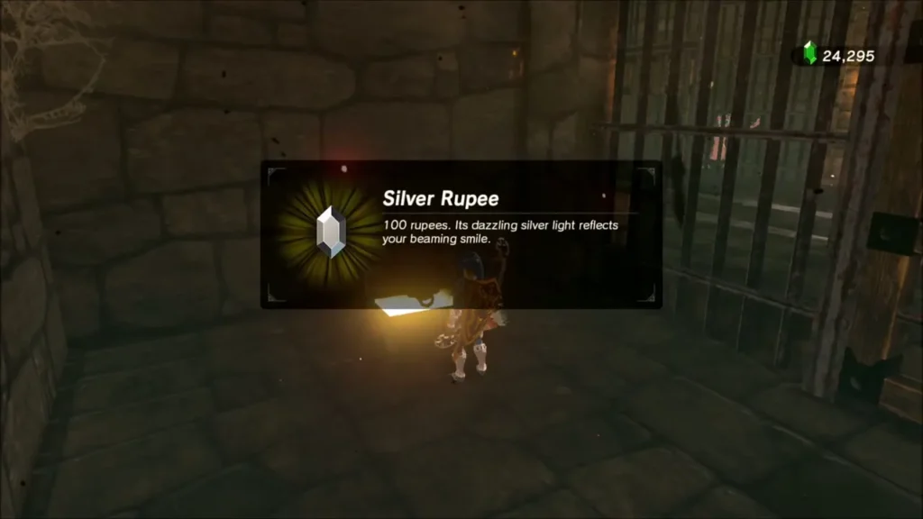 Link receiving a Silver Rupee from a chest in the Lockup Link receiving a Silver Rupee from a chest in the Lockup