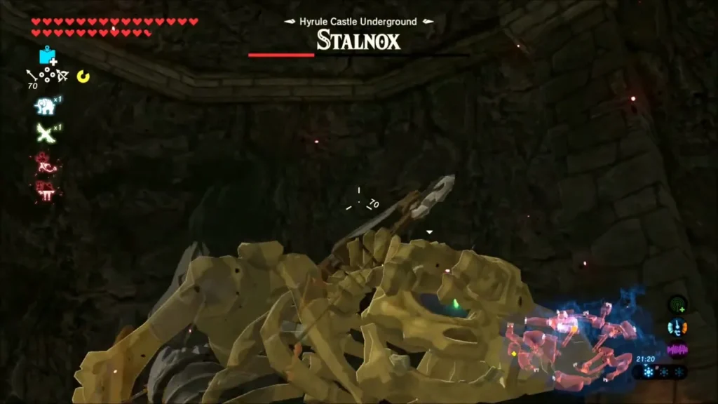 Stalnox collapsed and stunned with Link aiming at its eye Stalnox collapsed and stunned with Link aiming at its eye