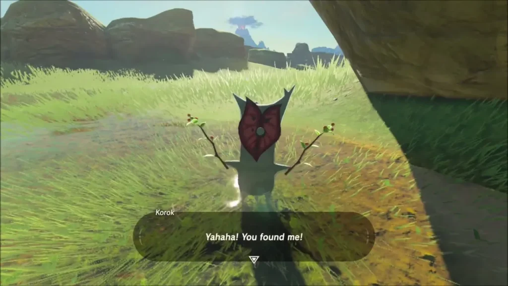 A Korok in the grass beside the boulder arch saying Yahaha A Korok in the grass beside the boulder arch saying Yahaha