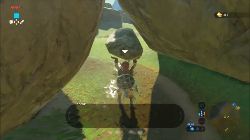 Link lifting the small stone under the boulder arch Link lifting the small stone under the boulder arch