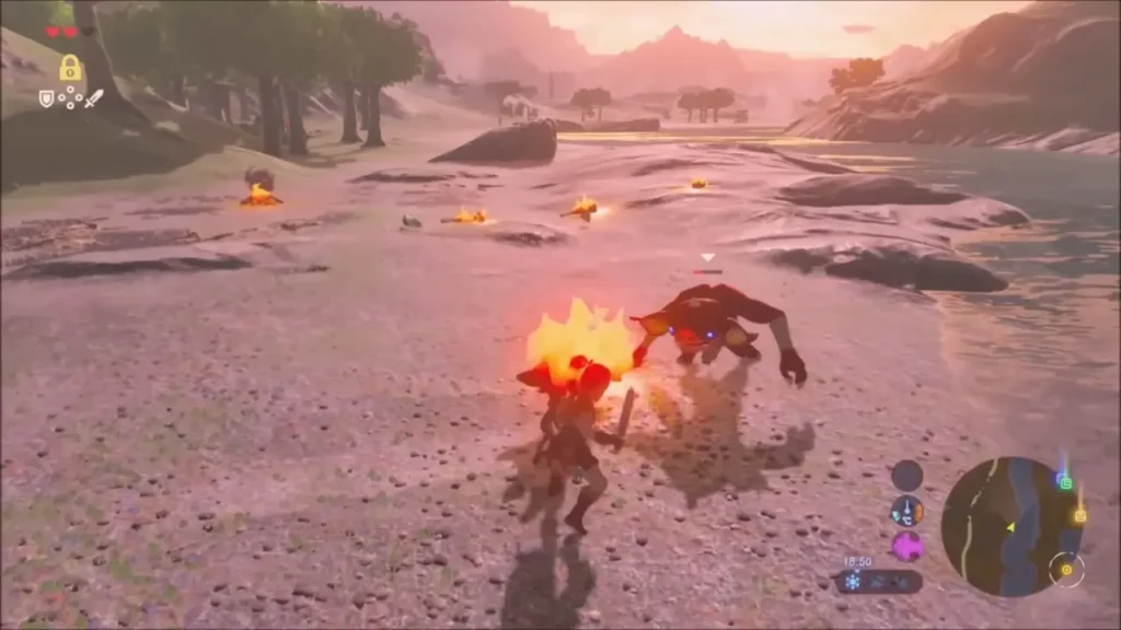 Link fighting a Bokoblin on the shore beside burning campfires Link fighting a Bokoblin on the shore beside burning campfires