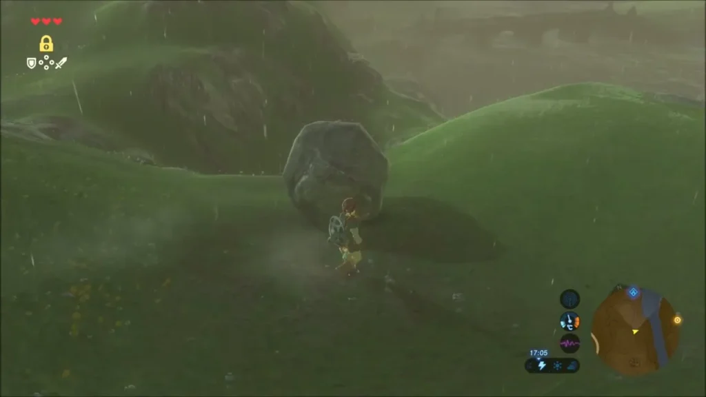 Link pushing a loose boulder across a rainy grassy hillside Link pushing a loose boulder across a rainy grassy hillside