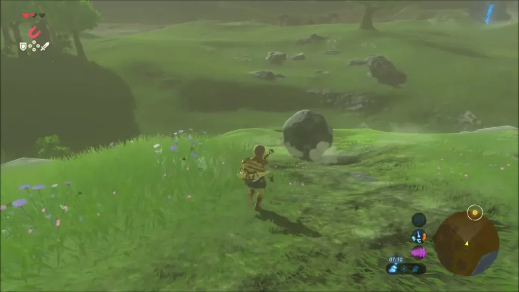 The boulder rolling downhill with Link following The boulder rolling downhill with Link following