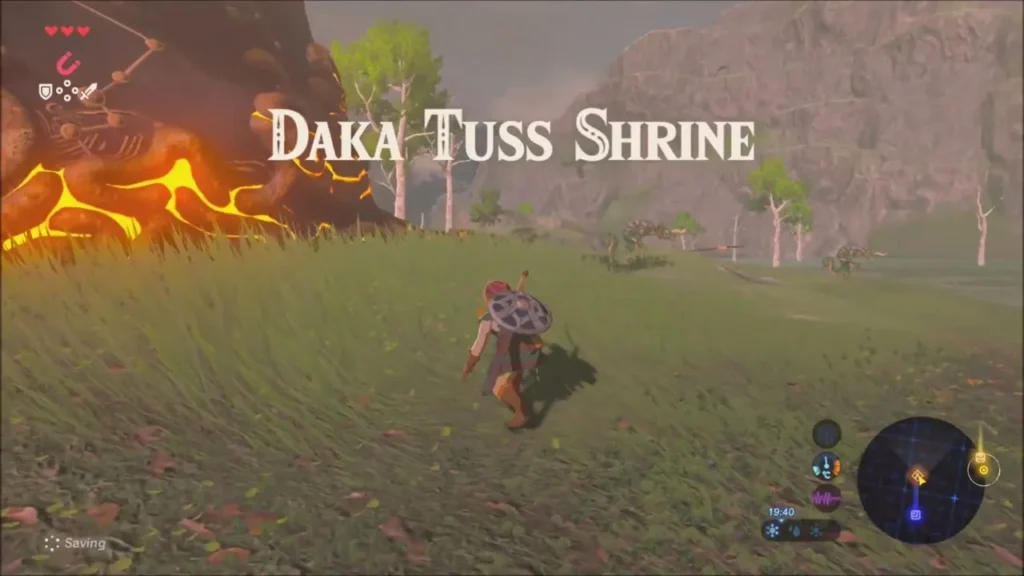 Link in the marsh as the Daka Tuss Shrine name appears, with Lizalfos in the distance Link in the marsh as the Daka Tuss Shrine name appears, with Lizalfos in the distance