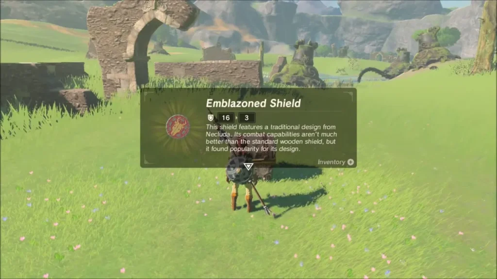 Link receiving the Emblazoned Shield from the chest Link receiving the Emblazoned Shield from the chest