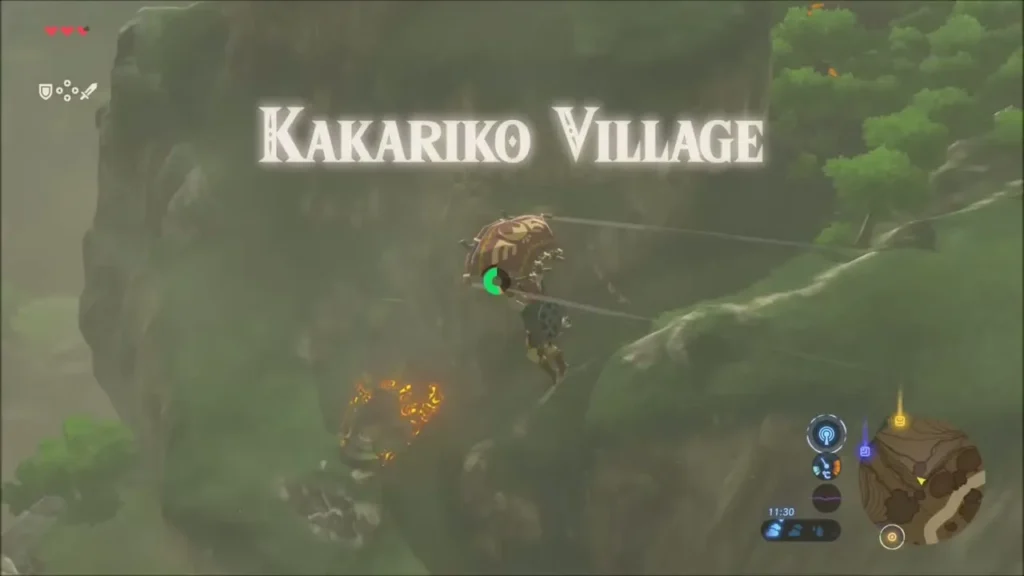 Kakariko Village title card with an orange shrine glow below Kakariko Village title card with an orange shrine glow below