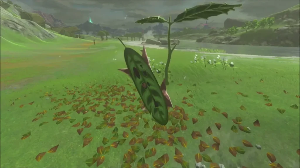 A Korok spinning up from a swirl of fallen leaves in the grass A Korok spinning up from a swirl of fallen leaves in the grass