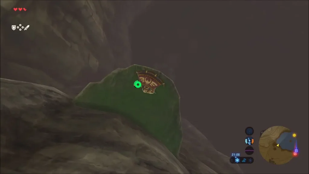 Link on a mossy ledge above the lake with the glider ready Link on a mossy ledge above the lake with the glider ready