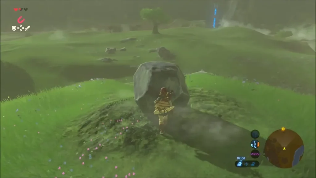 Link pushing a large boulder on a grassy hillside Link pushing a large boulder on a grassy hillside