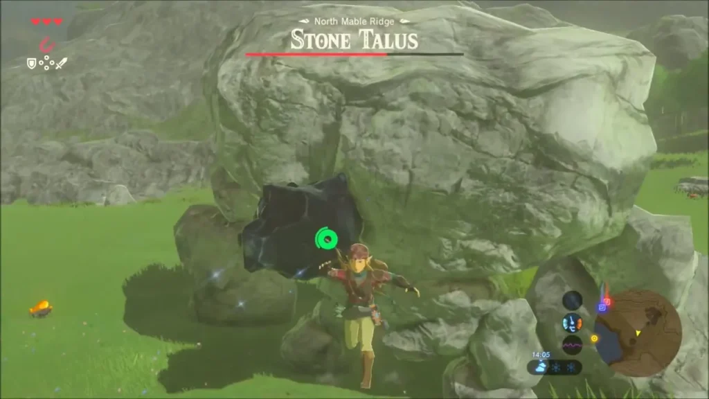 Link beside the Stone Talus with its dark ore deposit exposed Link beside the Stone Talus with its dark ore deposit exposed