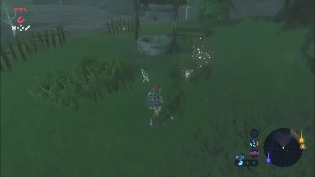 Link walking through rain-soaked grass past an old stone well Link walking through rain-soaked grass past an old stone well