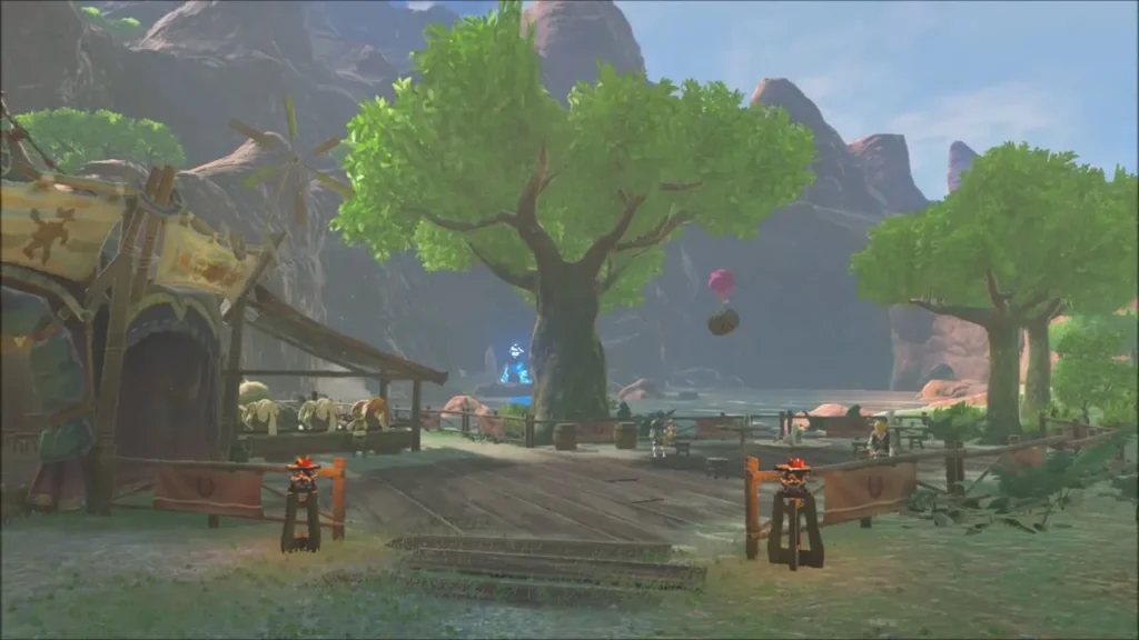 The balloon barrel drifts high above Woodland Stable and its big tree
