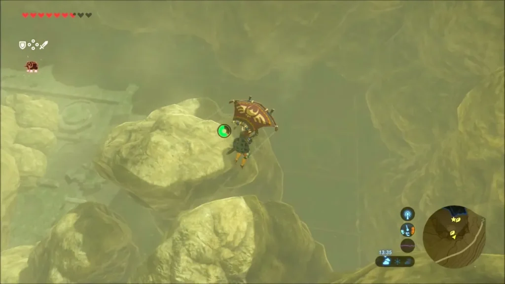 Link paragliding down into the ruined cave