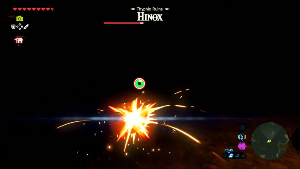 A hit on the Hinox with its health bar showing in the dark