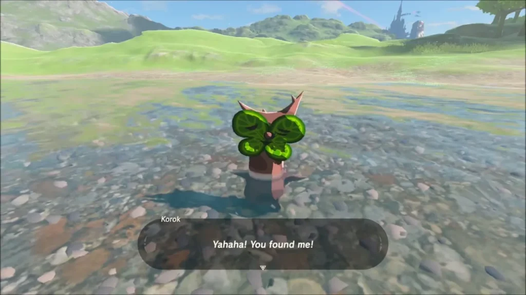 Korok in the stream shallows saying you found me
