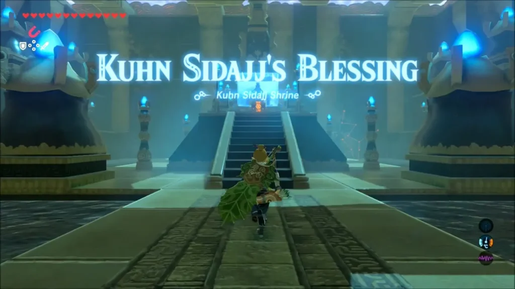 Kuhn Sidajj's Blessing title card as Link runs up the shrine hall