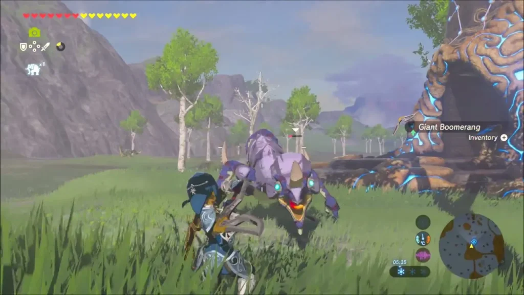 Lizalfos charging at Link in the grass near the Guardian wreck