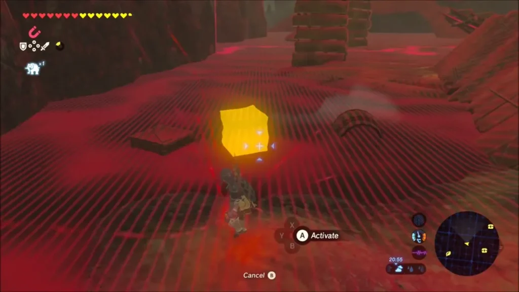 Link aiming Magnesis at a yellow-glowing chest in the mud among wooden planks