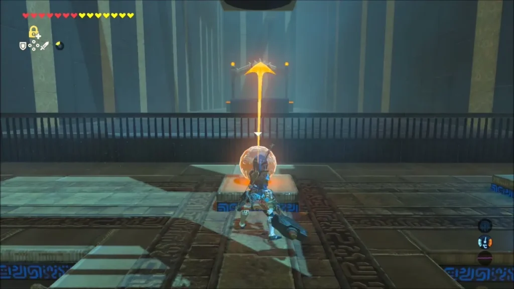 A ball frozen with Stasis and a force arrow pointing up, Link ready to strike