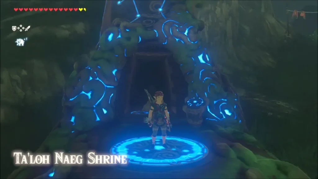 Link at the glowing entrance of Ta'loh Naeg Shrine at night