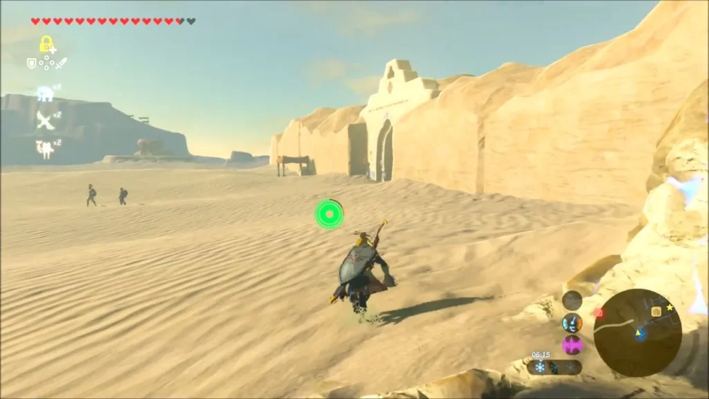 Link running across the desert sand toward the walls of Gerudo Town Link running across the desert sand toward the walls of Gerudo Town
