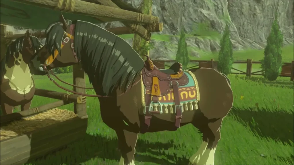 Brown horse in the stable with its original saddle Brown horse in the stable with its original saddle