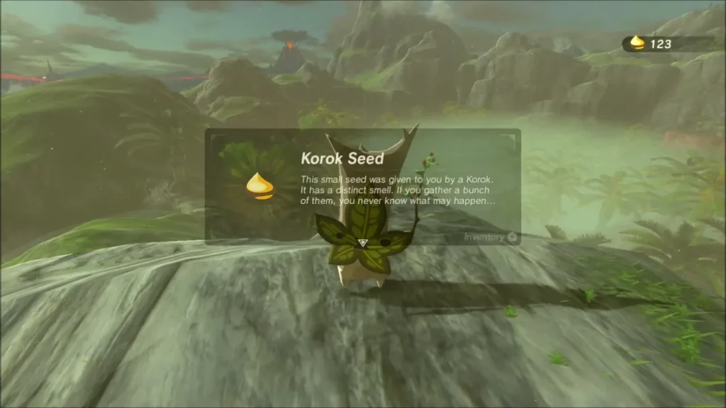 Korok on a rocky hilltop giving Link a Korok Seed Korok on a rocky hilltop giving Link a Korok Seed