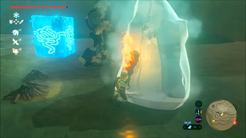 Link holding a torch beside a Cryonis ice block at night near Mount Granajh Link holding a torch beside a Cryonis ice block at night near Mount Granajh