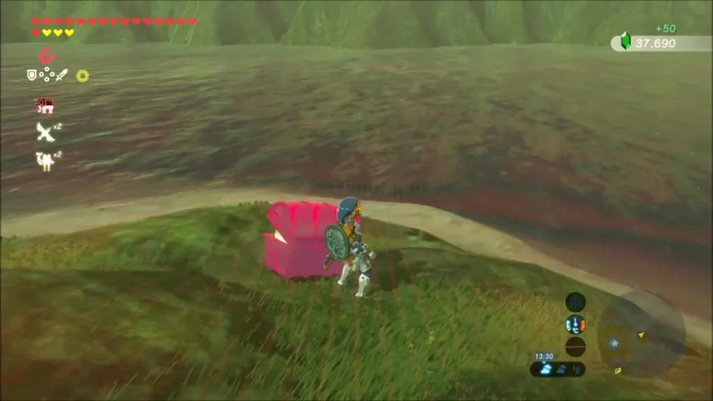 Link opening the chest on the grass that gives a Purple Rupee Link opening the chest on the grass that gives a Purple Rupee