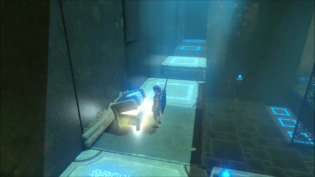 Glowing chest on a ledge beside the shrine's stepped platforms Glowing chest on a ledge beside the shrine's stepped platforms