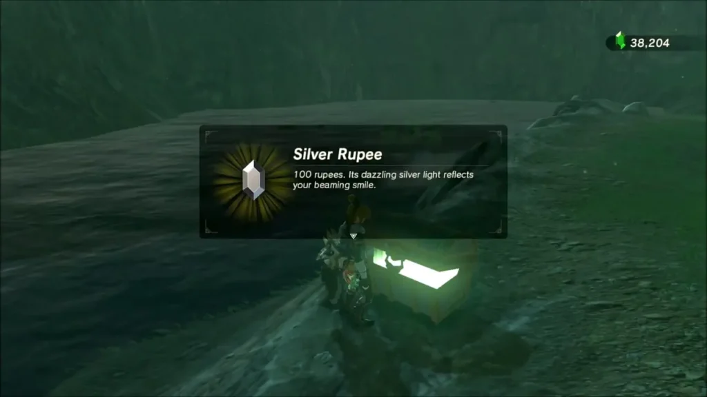 Silver Rupee item box above the opened chest, worth 100 rupees Silver Rupee item box above the opened chest, worth 100 rupees