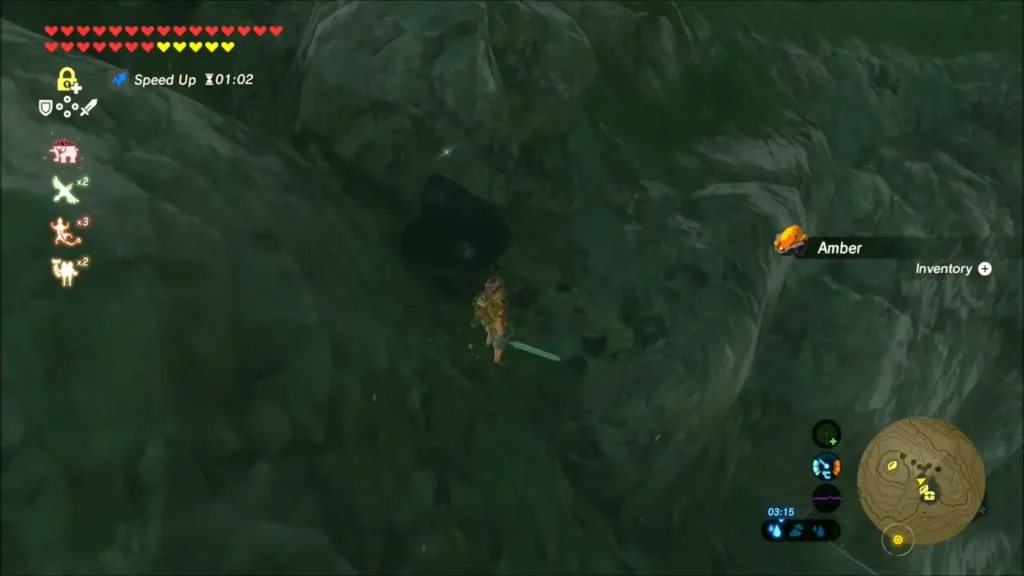 Link climbing the rocky ridge past a piece of amber Link climbing the rocky ridge past a piece of amber