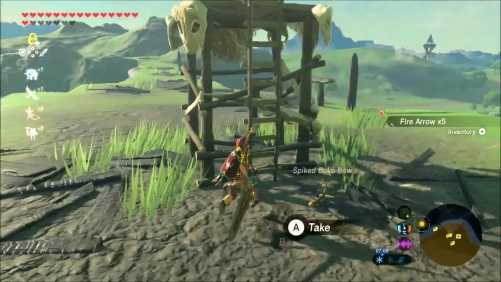 Link beside the wooden Bokoblin lookout tower picking up loot Link beside the wooden Bokoblin lookout tower picking up loot