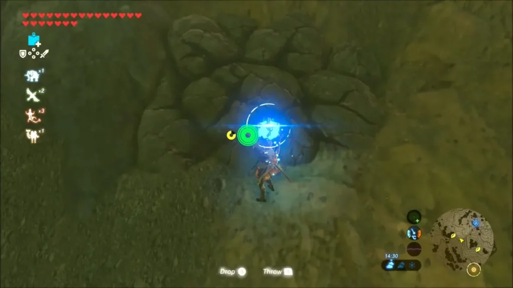 Link with a bomb at a cracked rock wall Link with a bomb at a cracked rock wall