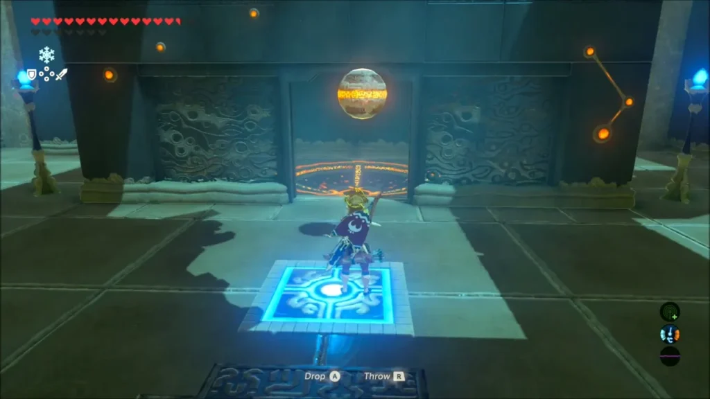 Link holding an orb on the floor plate before the gate Link holding an orb on the floor plate before the gate