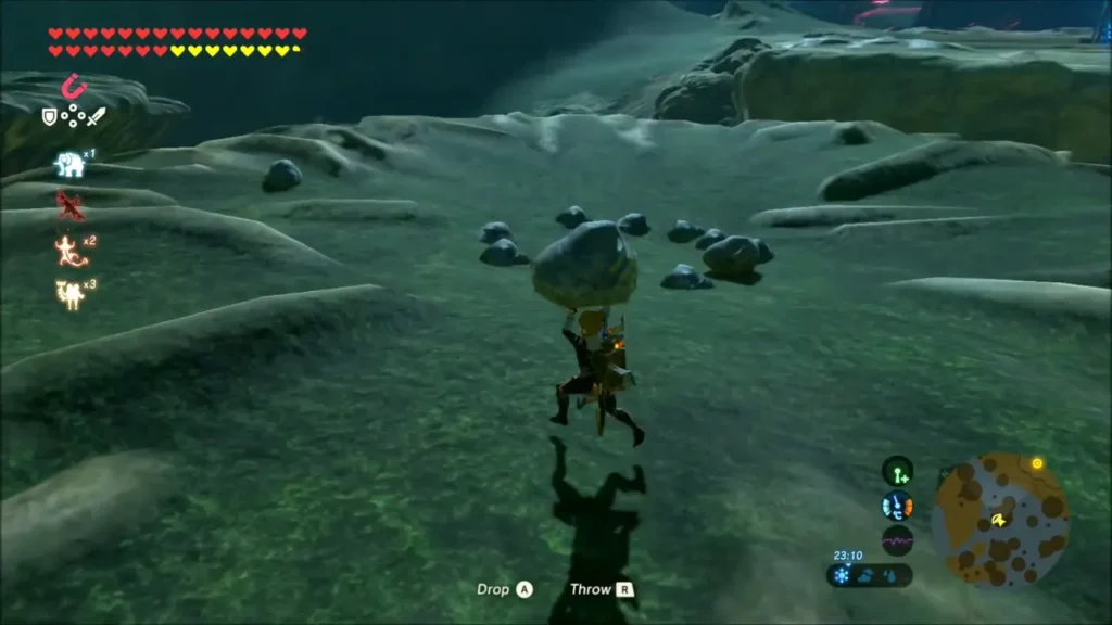 Link carrying a loose rock toward a ring of grey stones in the grass Link carrying a loose rock toward a ring of grey stones in the grass