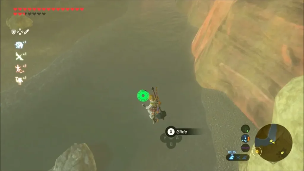Link gliding down into the dry river bed between the canyon walls Link gliding down into the dry river bed between the canyon walls