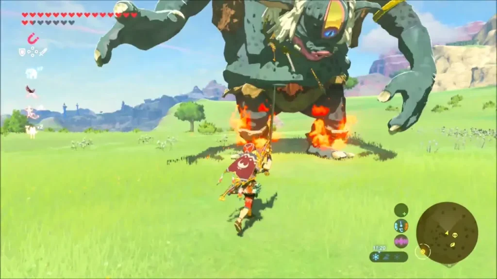 Link facing the Hinox as fire burns at its feet Link facing the Hinox as fire burns at its feet