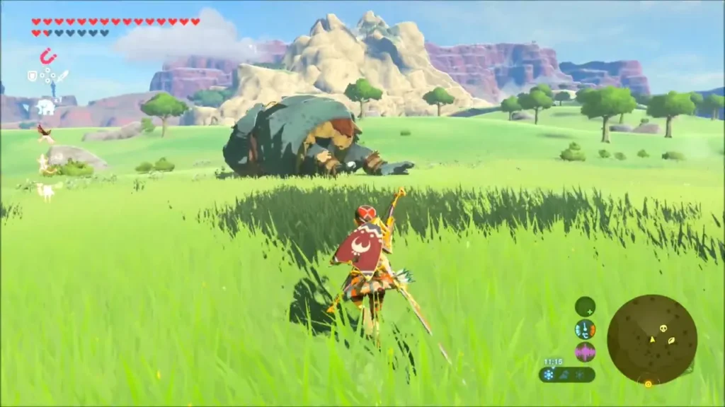 A sleeping Hinox on the open grass plain with Link approaching A sleeping Hinox on the open grass plain with Link approaching