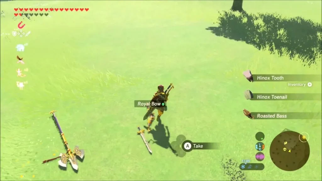 Hinox Tooth and Toenail drops beside a Royal weapon on the grass Hinox Tooth and Toenail drops beside a Royal weapon on the grass
