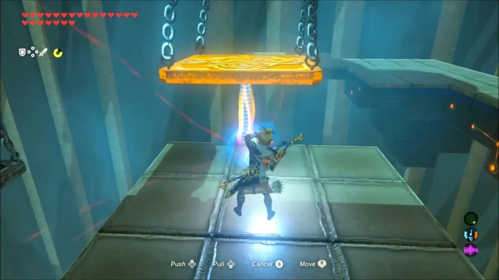 Link using Magnesis on a golden metal platform in Mogg Latan Shrine Link using Magnesis on a golden metal platform in Mogg Latan Shrine