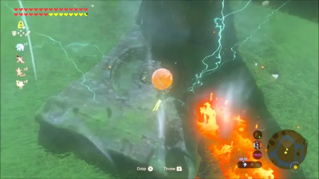 The orange orb dropped beside a stone slab on the plateau amid lightning and flames The orange orb dropped beside a stone slab on the plateau amid lightning and flames