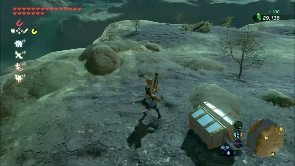 An opened chest beside Link on the snowy ridge An opened chest beside Link on the snowy ridge