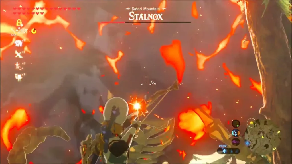 Link shooting a bomb arrow up at the Stalnox's eye amid flames Link shooting a bomb arrow up at the Stalnox's eye amid flames