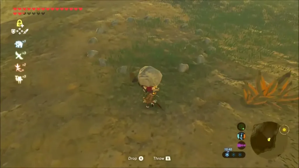 Link carrying a stone to a ring of small stones Link carrying a stone to a ring of small stones