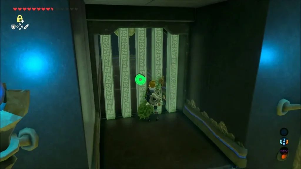 Link fanning the switch beside the gate with the Korok Leaf Link fanning the switch beside the gate with the Korok Leaf